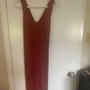 Rust  ribbed dress size M . With two side slits.